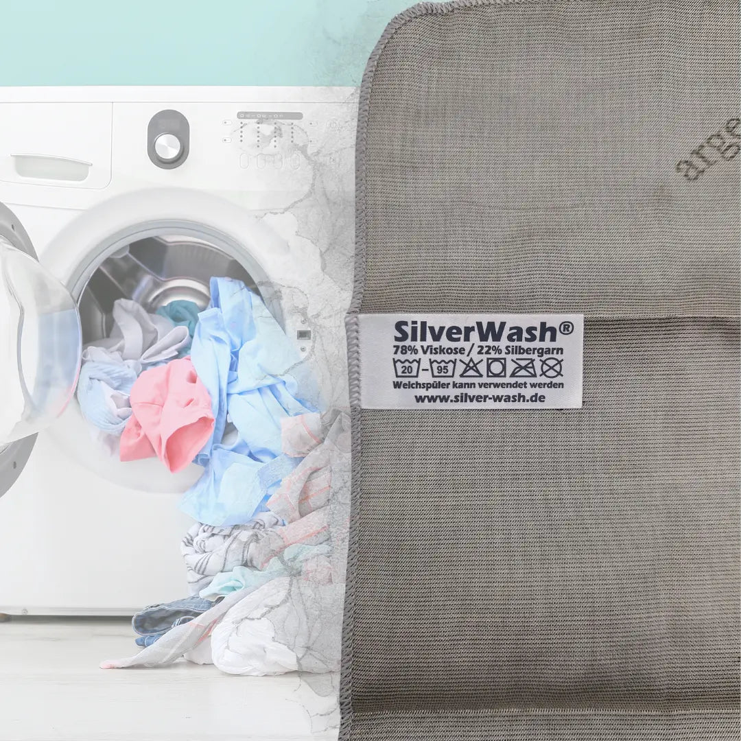 Silbertuch Etikett mit Waschmaschine daneben